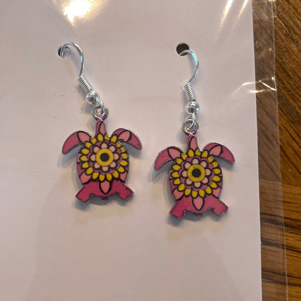 18.   “Turtle” earrings.